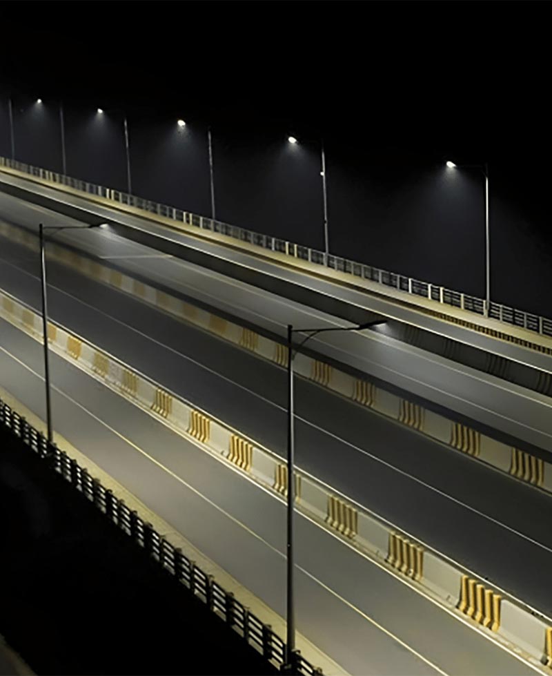 Urban&Streetscape Streetlights illuminate a stretch of highway